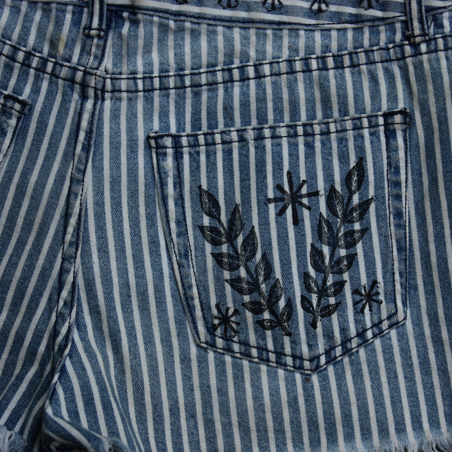 Scorpion pinstripe denim cutoffs